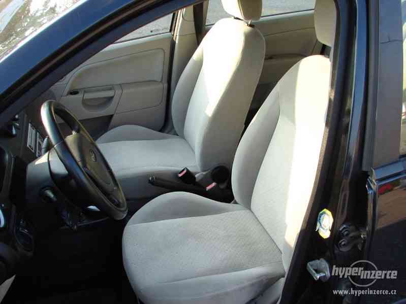 Ford Fiesta 1.4 TDCI r.v.2003 (AUTOMAT) - foto 12