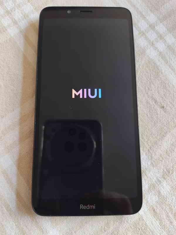 Mobilní dotykový telefon Xiaomi Redmi 7A - foto 4