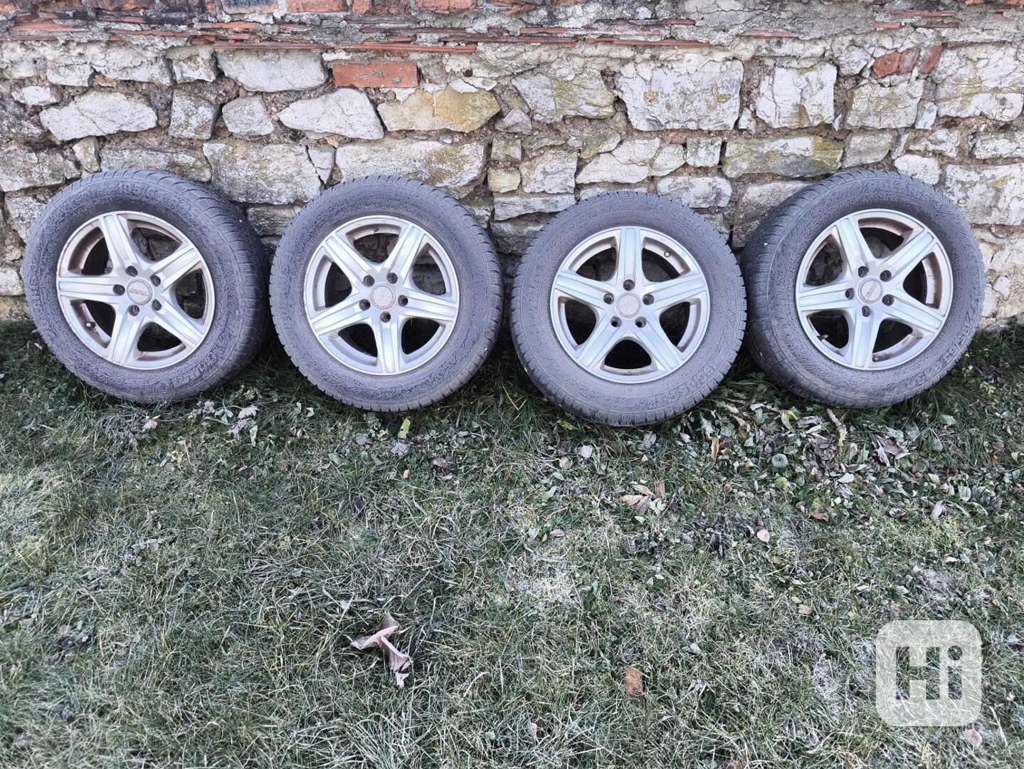 Pěkné zimní pneu na Al. diskách 5 X 110 z Opel Zafira. - foto 1