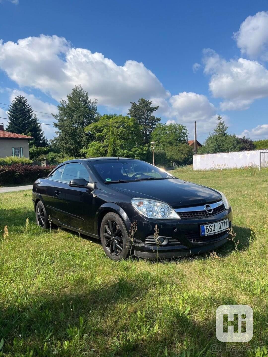 Opel Astra 1,8 - foto 1