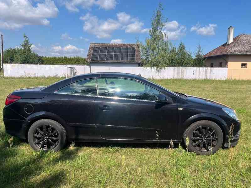 Opel Astra 1,8 - foto 11