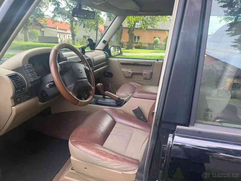 Land Rover Discovery 4,0   V8, vyvložkovaný, střešní stan - foto 6