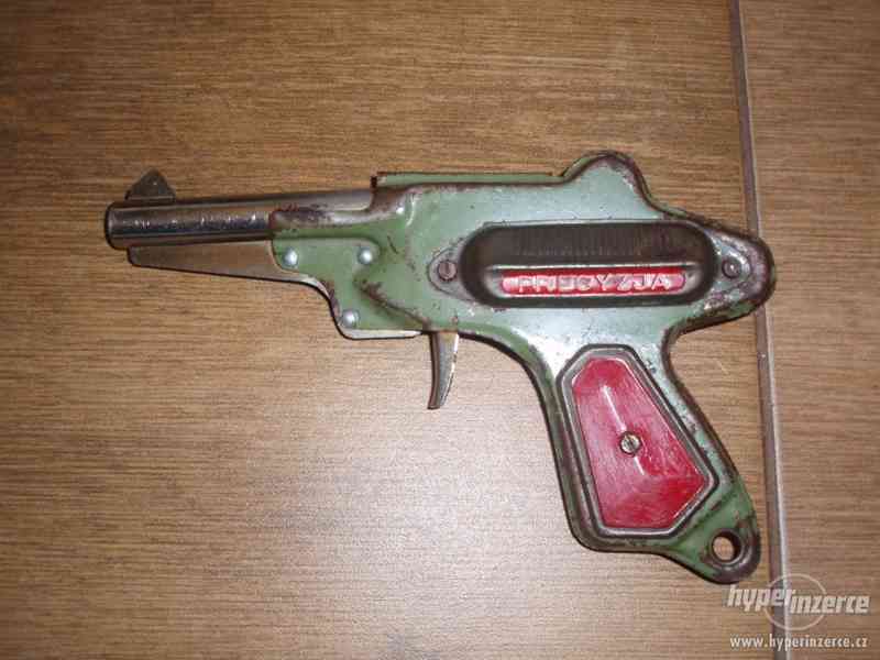 Staré kovové hračky - pistolka - Precyzja,  hrající mlýnek - foto 2