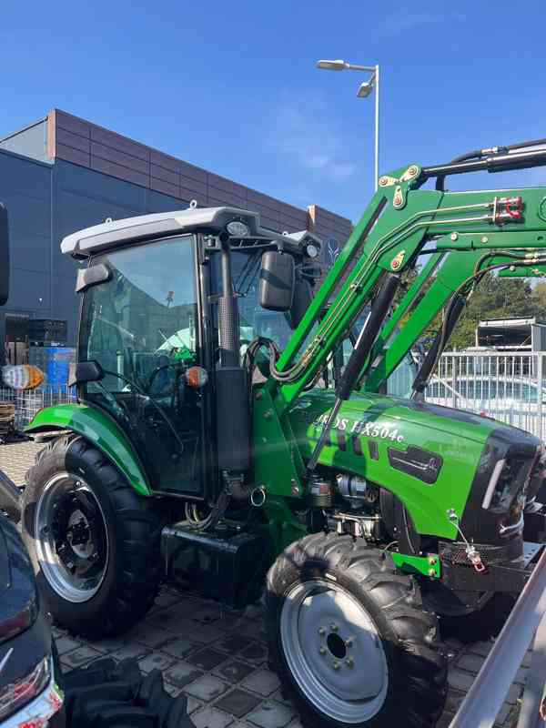 Tauros HX504 s kabinou a čelním nakladačem - foto 3