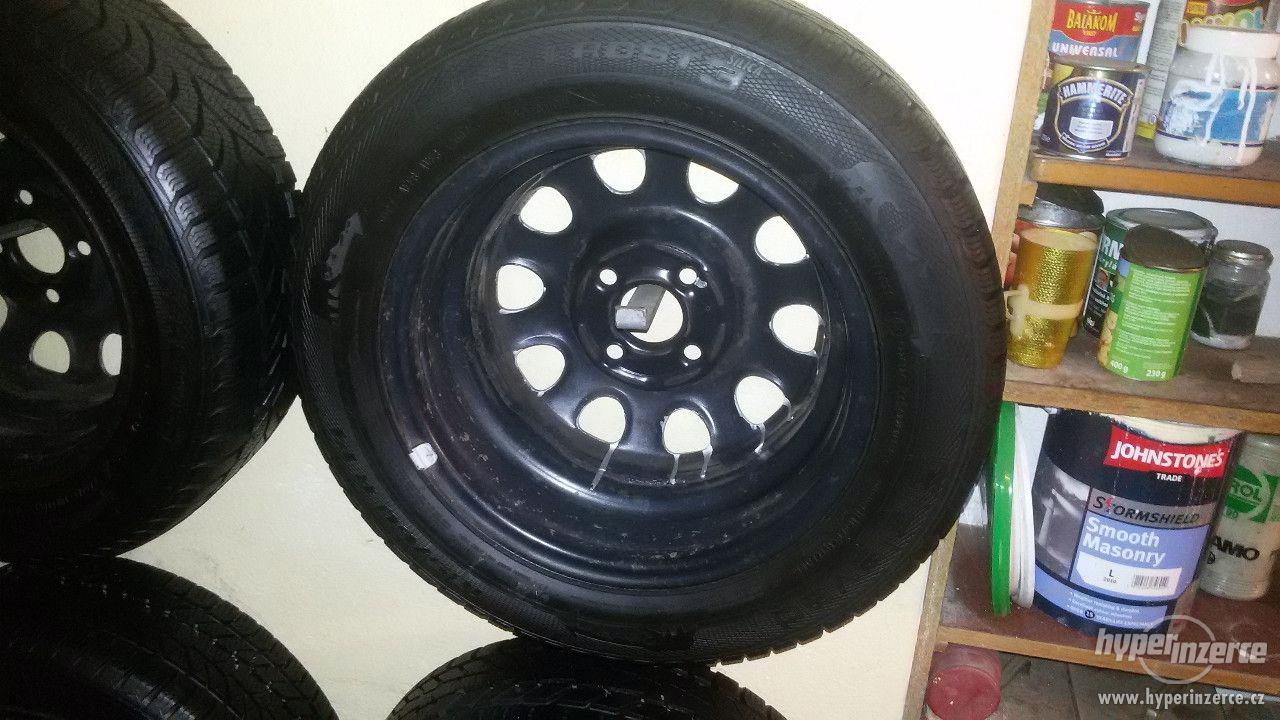 Zimní pneumatiky na discích - foto 1