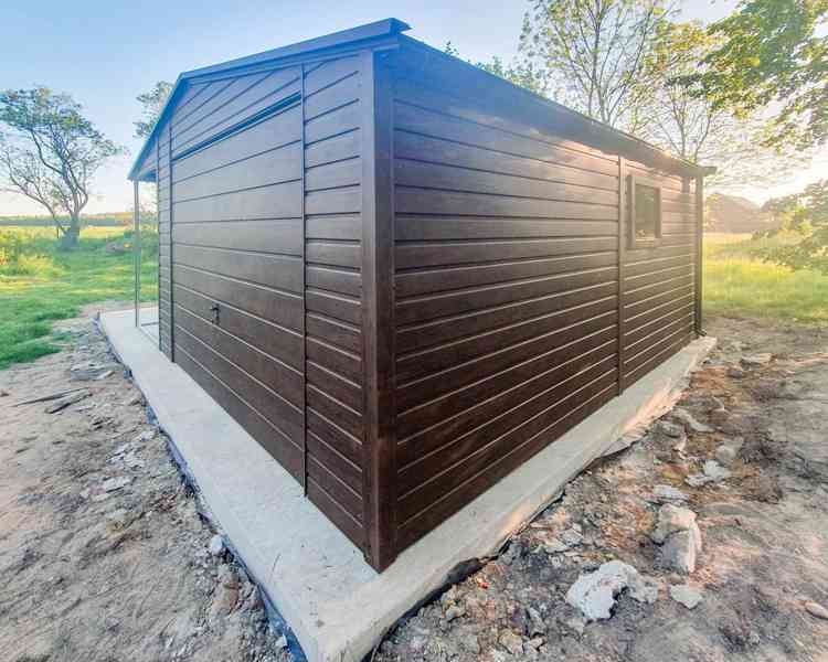 Plechova garáž 4,5x6m + přístřešek 2m - výklopná vrata TS729 - foto 2