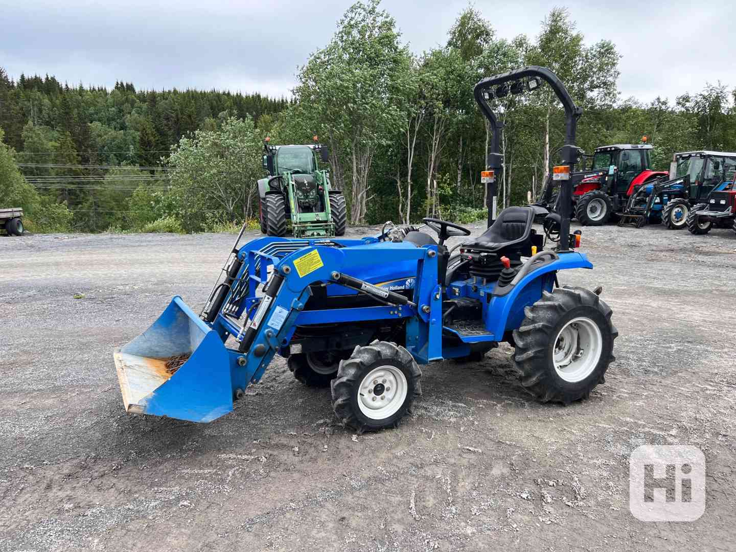 Traktor New Holland KUN TC21D6 + kompletní čelní nakladač - foto 1