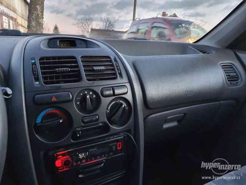 Mitsubishi Carisma 1.6 GLX 66kW - foto 12
