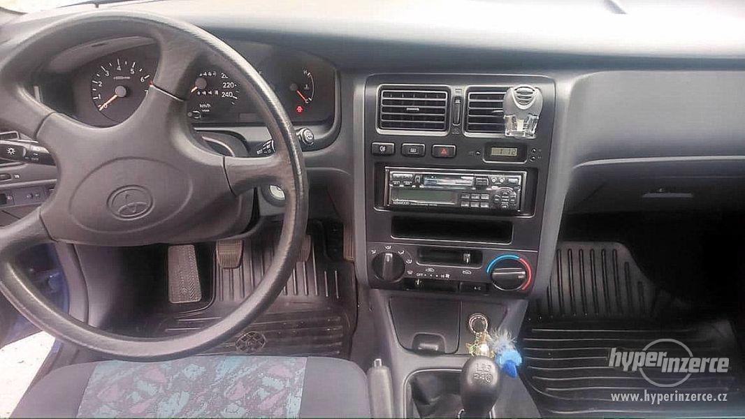 ToyotaCarinaE 1,6 XLi 16V;RV96;klima,rádio,1maj,zak. nové - foto 21