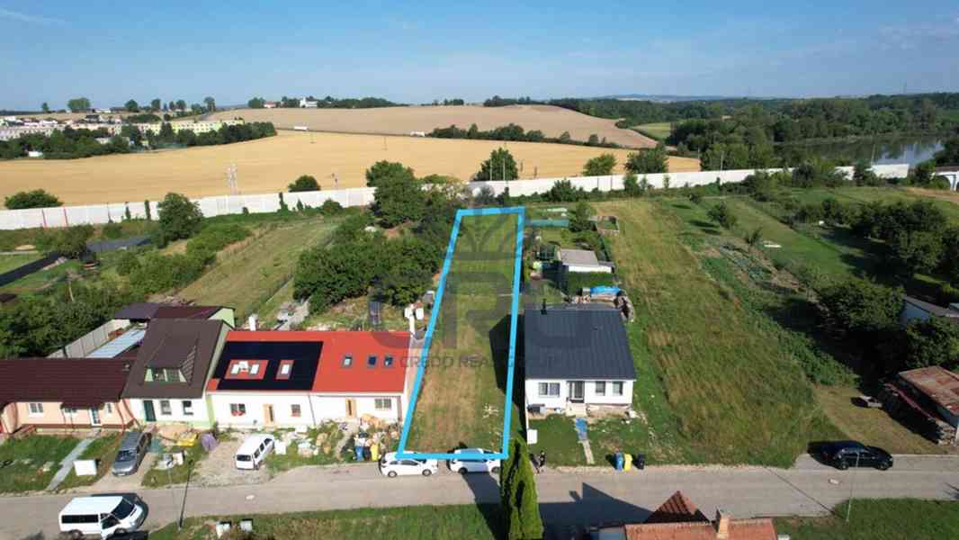 NABÍDKA STAVEBNÍHO POZEMKU V HRUŠOVANECH O CP 1.030 m2 - foto 1