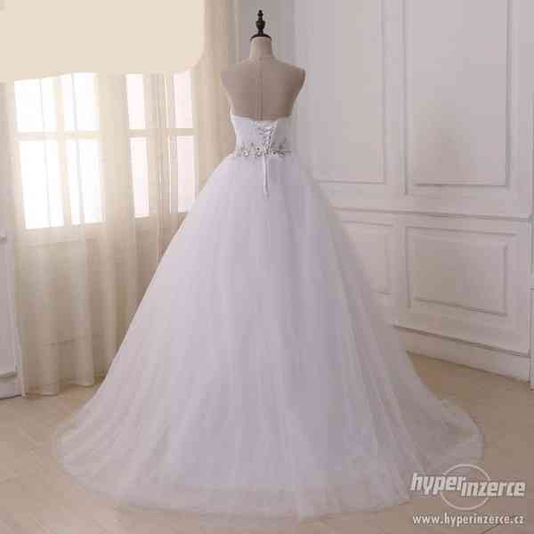 Nové bílé svatební šaty vel. M-XL, skladem - foto 4
