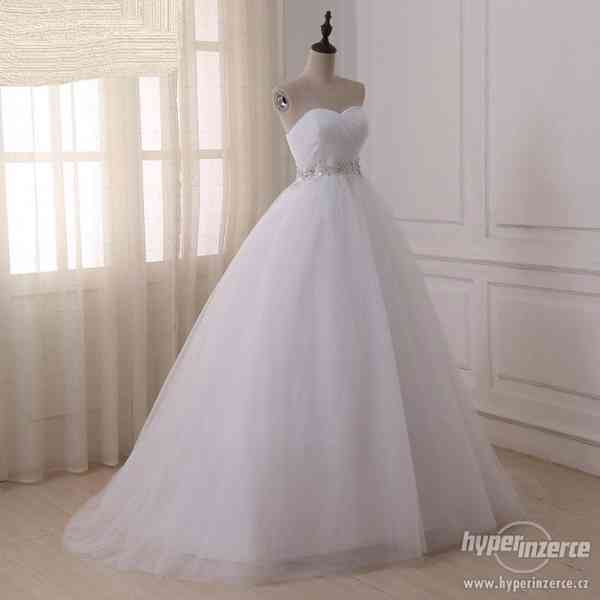 Nové bílé svatební šaty vel. M-XL, skladem - foto 5