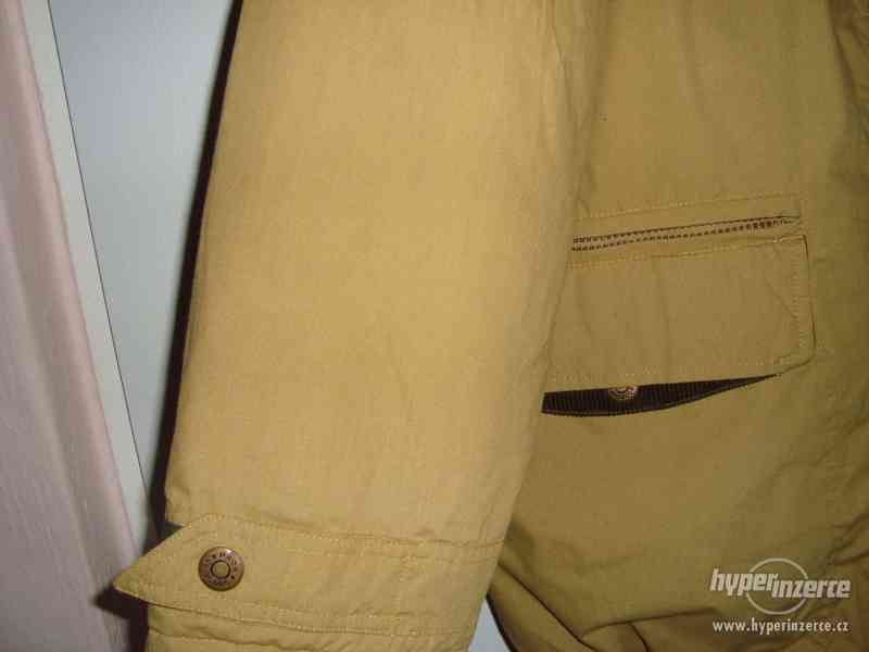 Kvalitní velmi pěkna vyteplená bunda  Vel 50 - foto 2