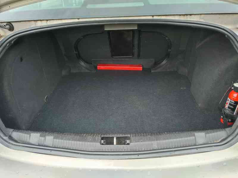Opel Astra Sedan  - foto 6