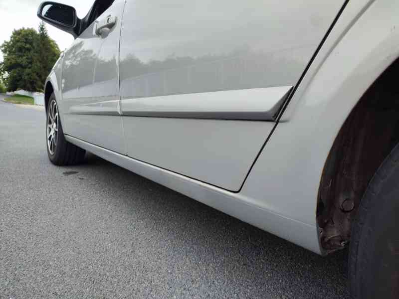 Opel Astra Sedan  - foto 8