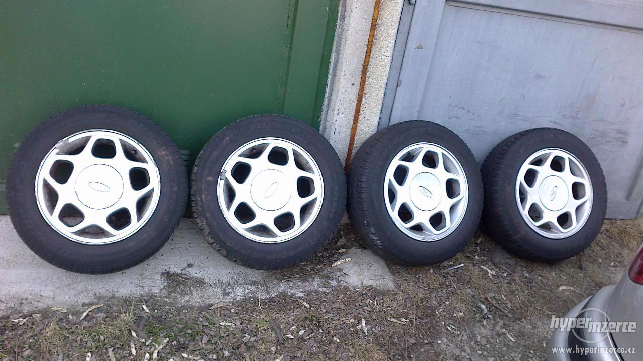 Prodám 4ks alu disků 14" 4x108 Ford s pneu - foto 1