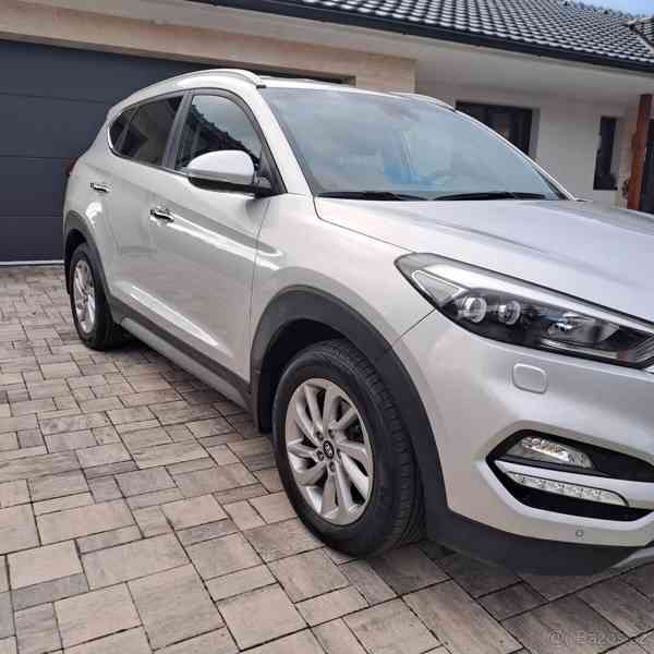 Hyundai Tucson 2,0   CRDi automat 4x4 90tis. - foto 21