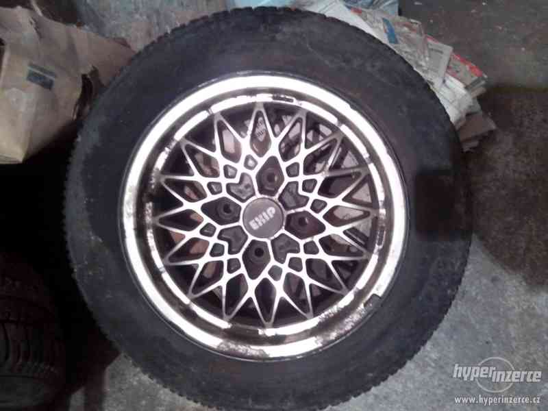 Peugeot 309 - alu kola 14" - foto 1