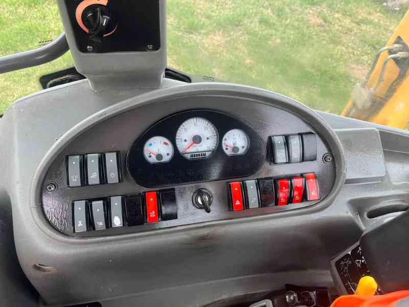 Traktorbagr Volvo BL71  - foto 10