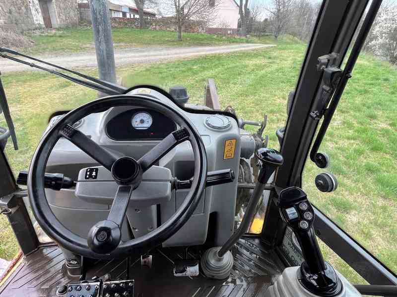 Traktorbagr Volvo BL71  - foto 11