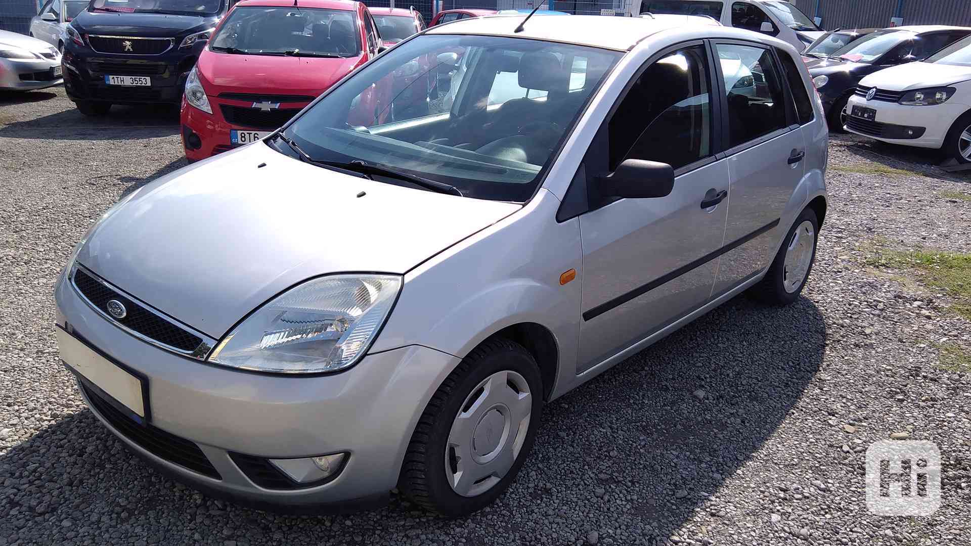 FORD Fiesta 1,4i Comfort - foto 1