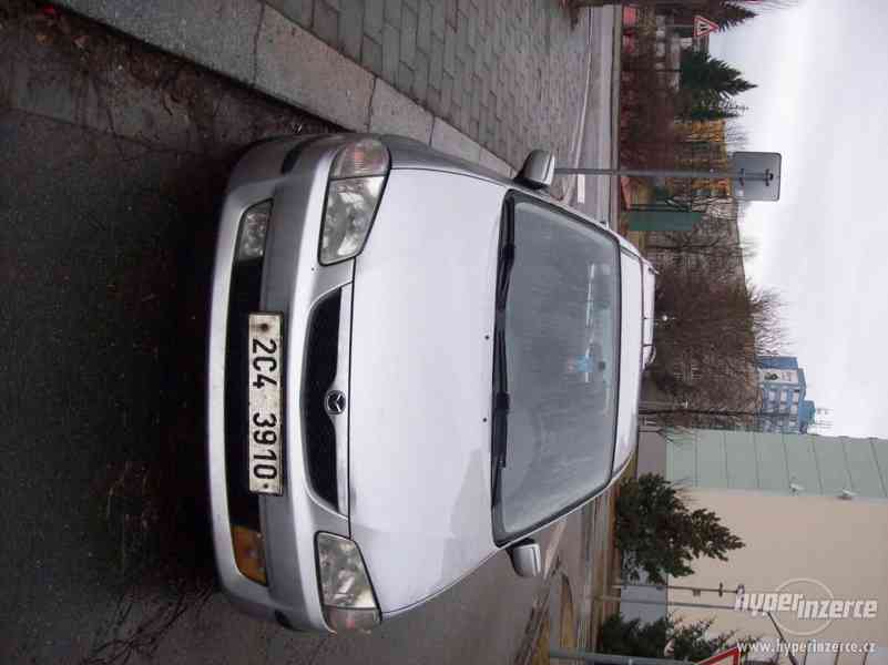 Mazda 323F - foto 1
