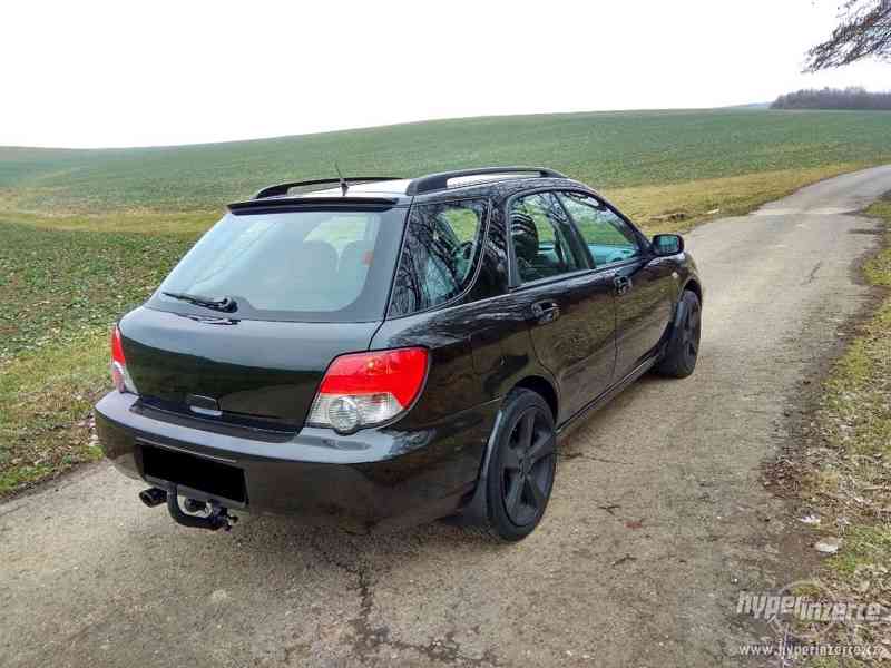 Subaru Impreza 2.0 - foto 4