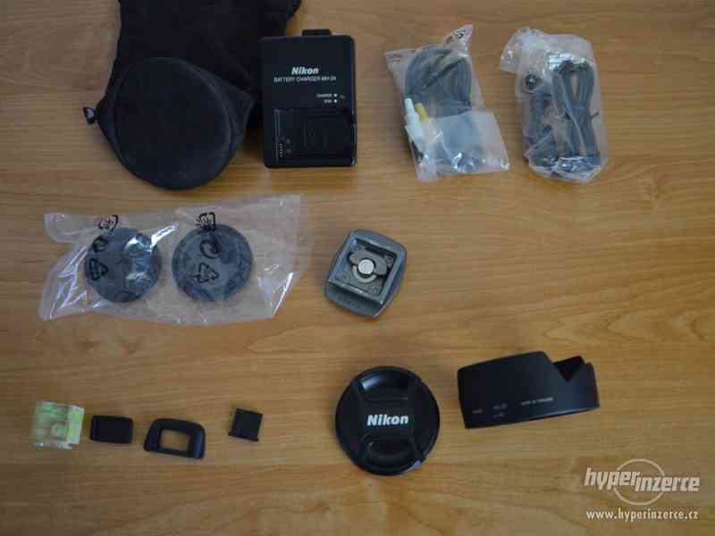 Prodám Nikon D5100 + 18-105 AF-S DX VR, stativ a brašnu - foto 7