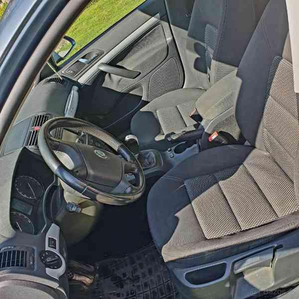 Škoda Octavia Scout kombi 4x4 2 TDI 103 kW - foto 21
