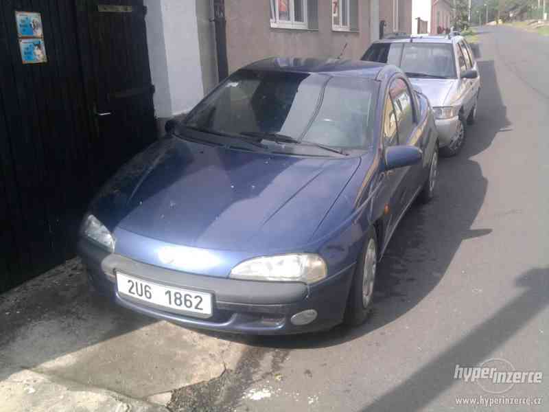 Prodam Opel Tigra 1.4 66kw r.v 96 - foto 3