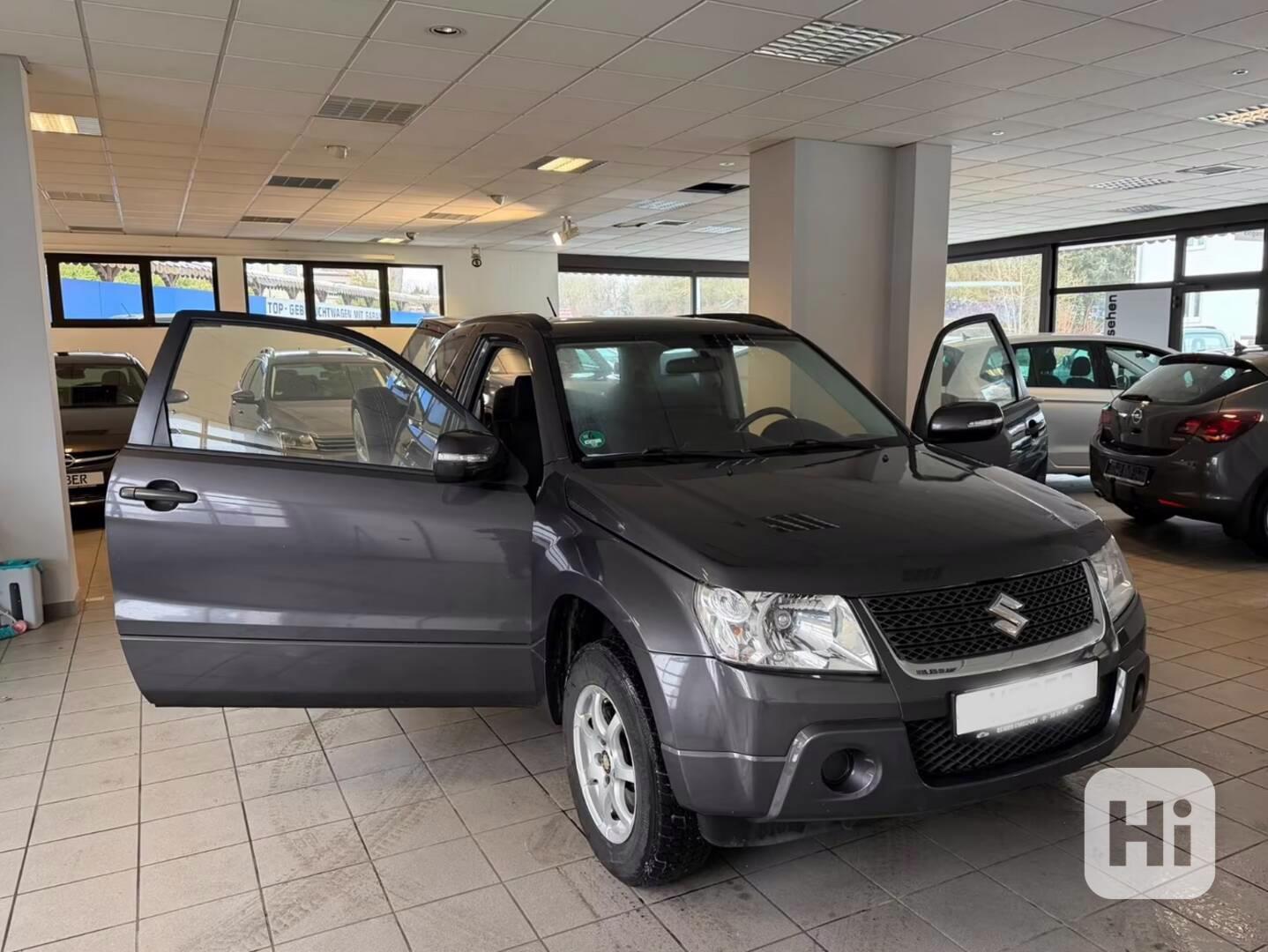 Suzuki Grand Vitara 1.6i 4X4 benzín 78kw - foto 1