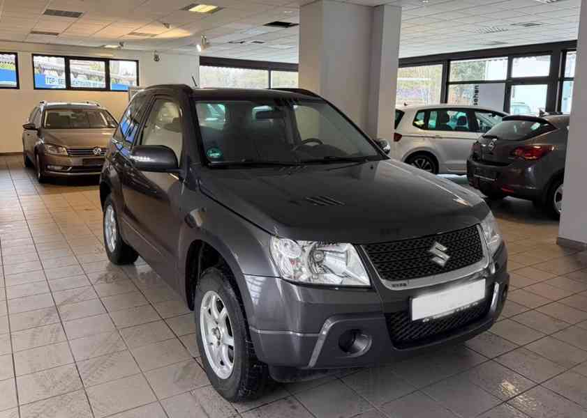Suzuki Grand Vitara 1.6i 4X4 benzín 78kw - foto 13