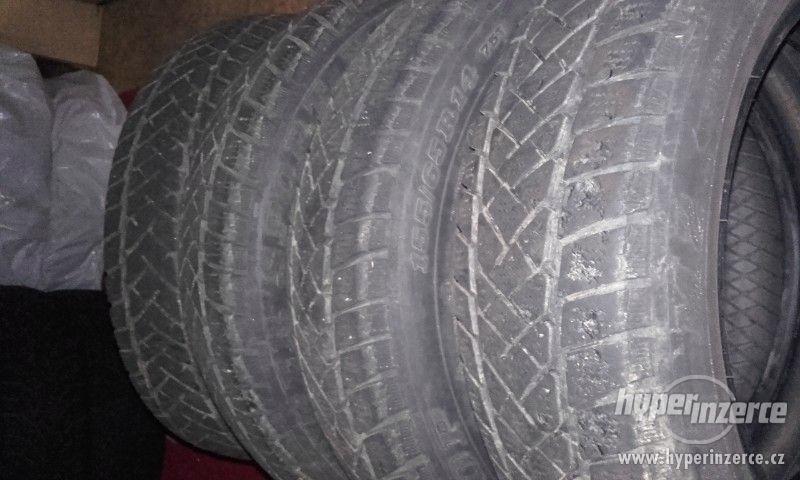 Prodám zimní pneu Dunlop-155/65-R14-použité