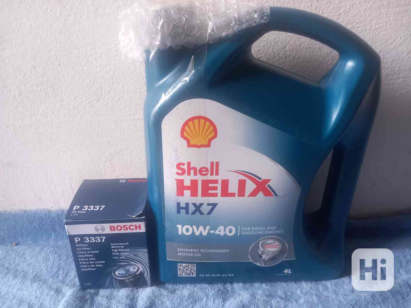 Shell Helix HX7 10W- 40 / 4l + o.f. Bosch 0 451 103 337 - foto 1