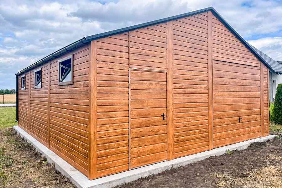 Plechova garáž 7x7m - výklopná vrata - dveře - 6x okno TS770 - foto 4