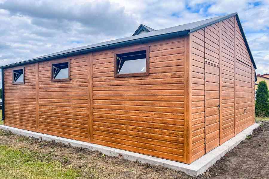 Plechova garáž 7x7m - výklopná vrata - dveře - 6x okno TS770 - foto 2