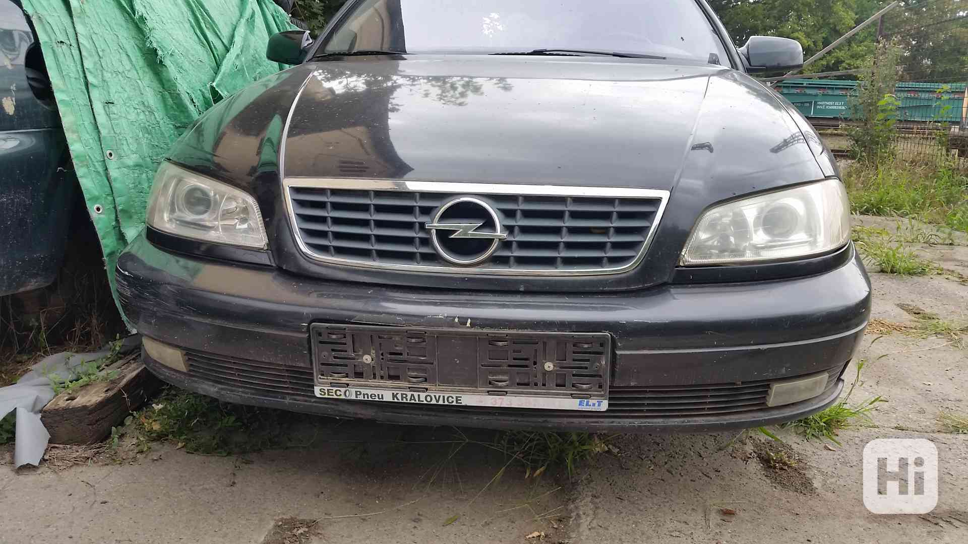 svetla - opel omega - foto 1