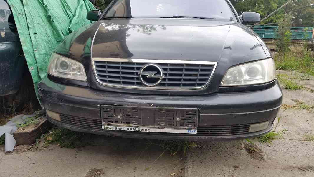 svetla - opel omega - foto 1