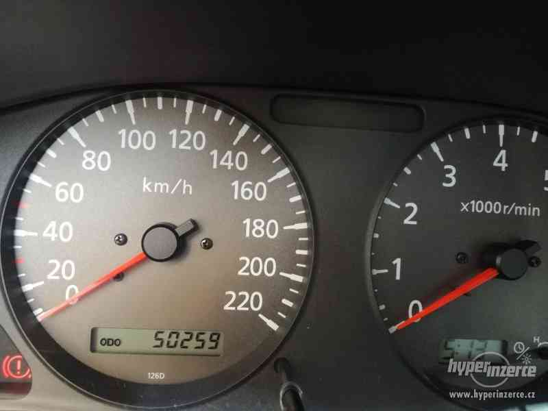 Nissan Almera 50 000 km - foto 12