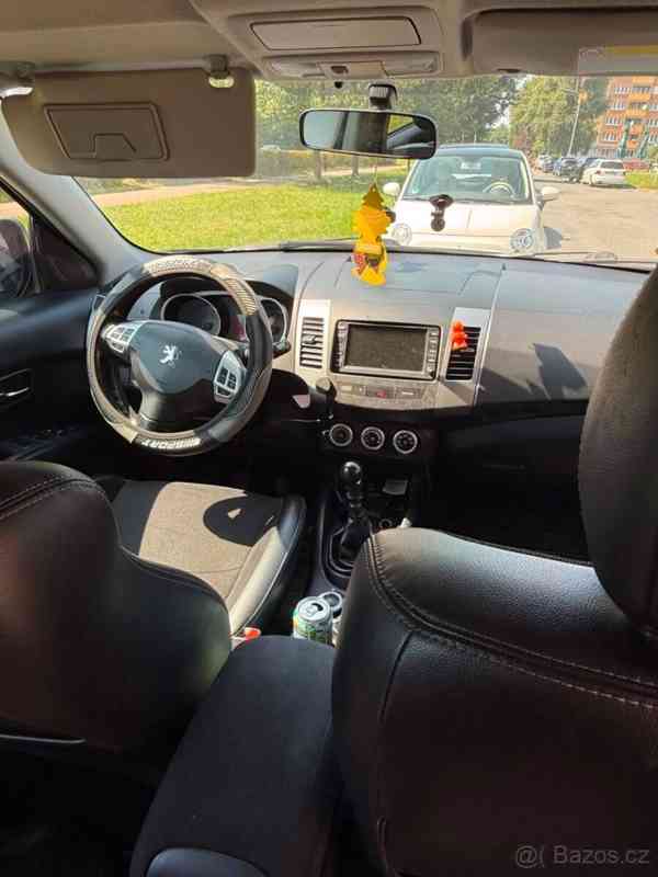 Peugeot 4007 2,2   4×4 7 míst - foto 6