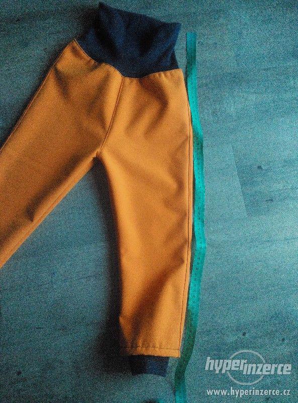 Softshellové kalhoty zimní,oranž. cca 92/98 - foto 5