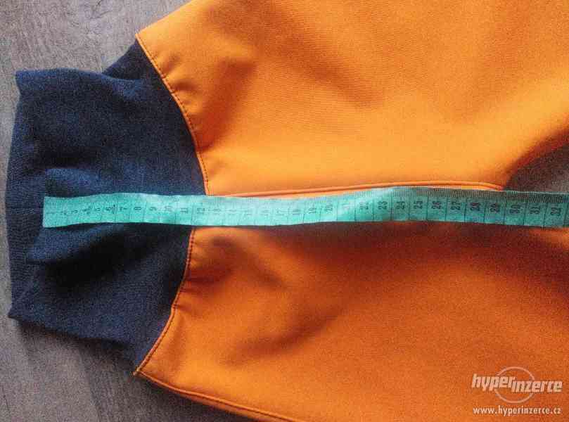 Softshellové kalhoty zimní,oranž. cca 92/98 - foto 9