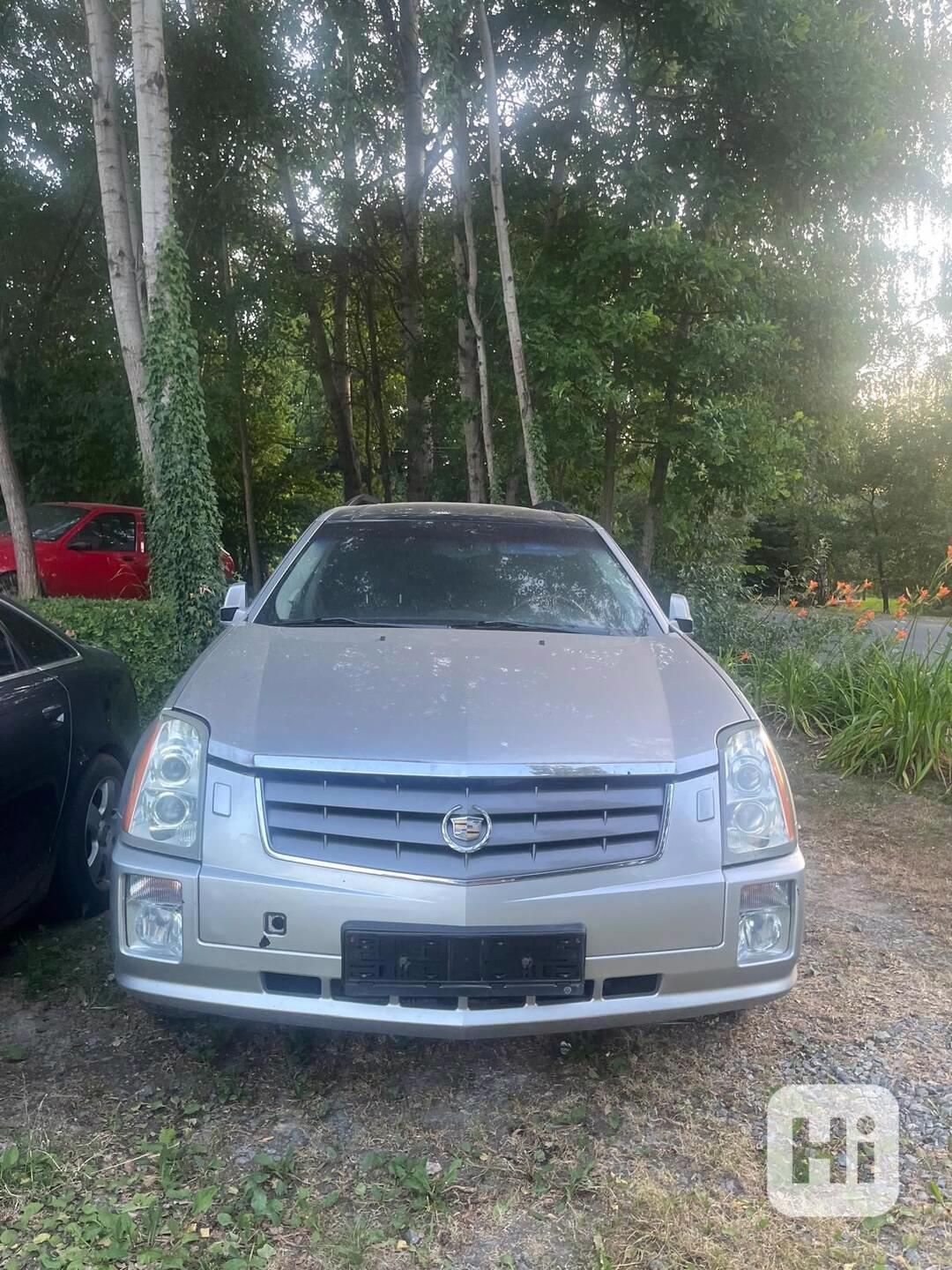 Cadillac srx 3,6 - foto 1