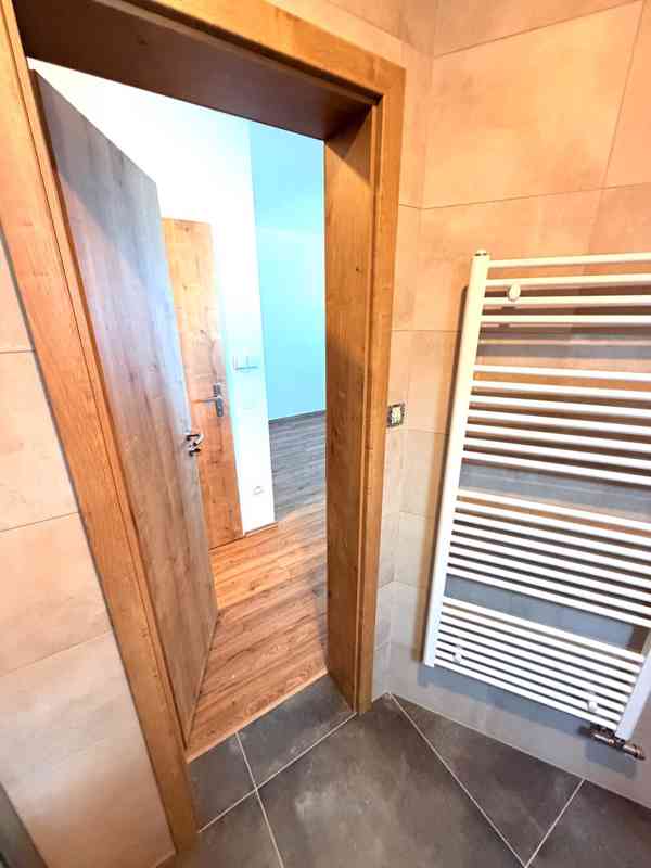 PRONÁJEM NOVOSTAVBY BYTU 2+KK S PARKOVACÍM STÁNÍM V BRNĚ - foto 12