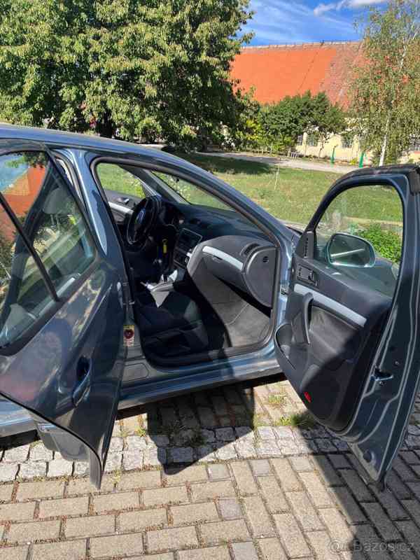 Škoda Octavia 1,6   TDI 77kW - foto 16