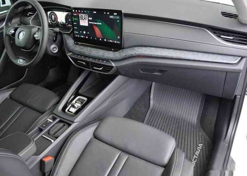Škoda Octavia 2,0TDi FACELIFT TOP VÝBAVA 1.M - foto 12