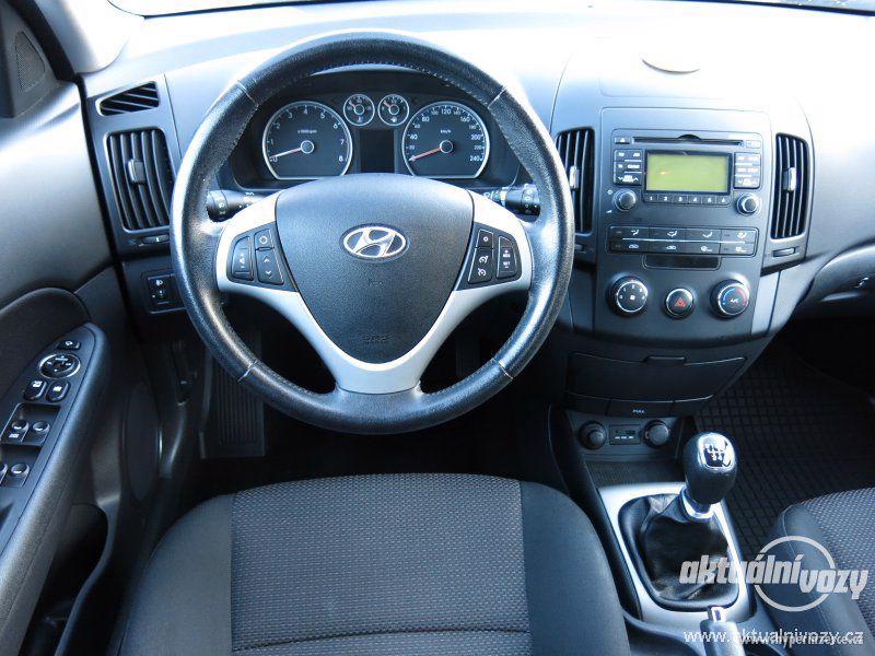 Hyundai i30 1.4, benzín, rok 2012 - foto 3