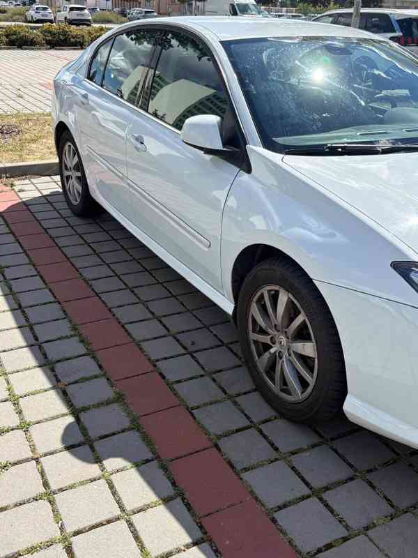 Renault Laguna lll, 2011 - foto 13