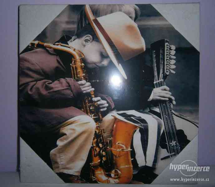 Obraz na plátně-kluk se saxofonem-rozměry: 29,5cm x 29,5cm - foto 1