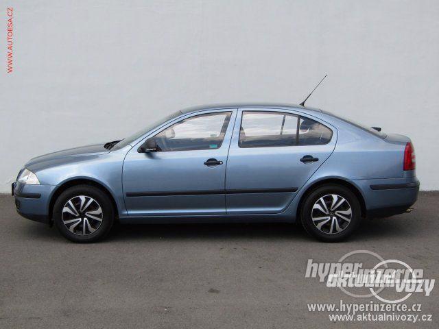 Škoda Octavia 1.6, benzín, rok 2011 - foto 9